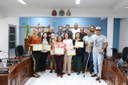 Moção de Congratulações em virtude do trabalho realizado pela equipe do projeto. (<a class="download" href="https://www.ilhacomprida.sp.leg.br/institucional/fotos/28-05-19-entrega-de-mocao-aos-funcionarios-do-proj-ilha-jovem/entrega-de-mocao-aos-funcionarios-do-projeto-ilha-jovem-28-05-19-28/at_download/image">Download</a>)